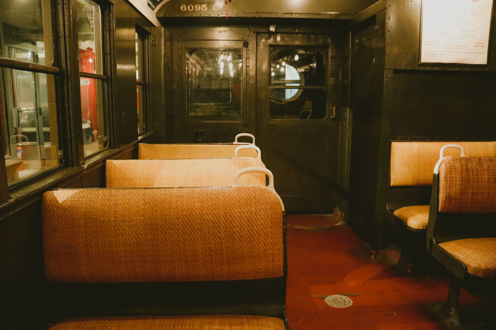 Worn seats inside an old train carriage